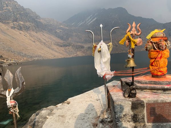 Statue of Lord Shiva with Trishul and Shiva Linga overlooking Gosainkunda Lake