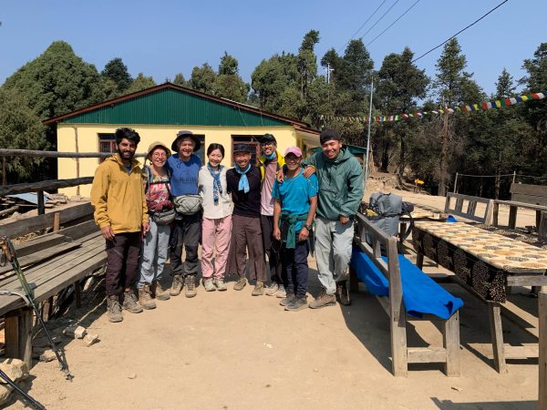 Group of trekkers posing on the Gosainkunda trekking trail in Nepal